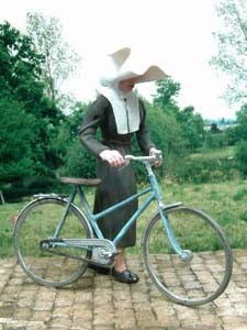 F139 Nun and her bicycle Image